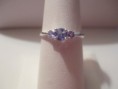 Dainty three-stone tanzanite set in sterling silver